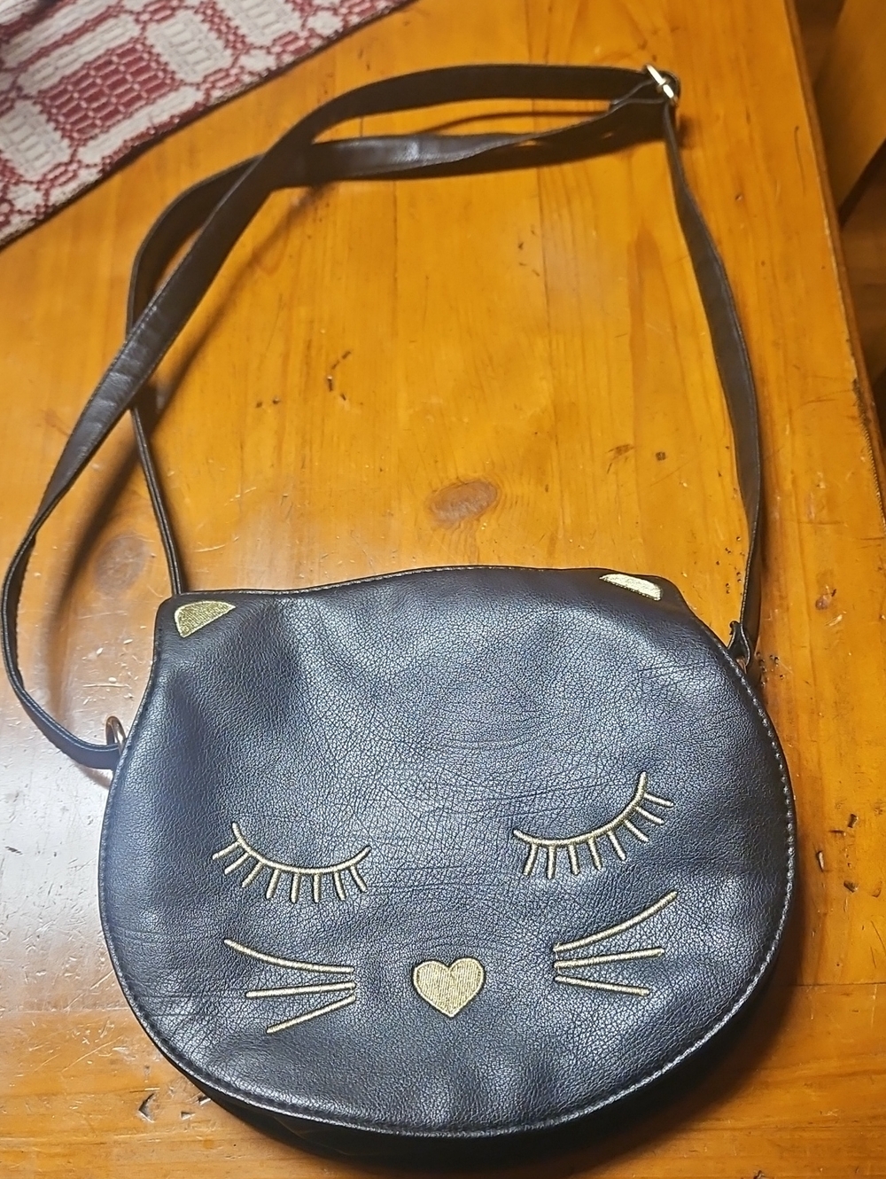 Torrid Black Cat Face Crossbody Bag with Gold Accents